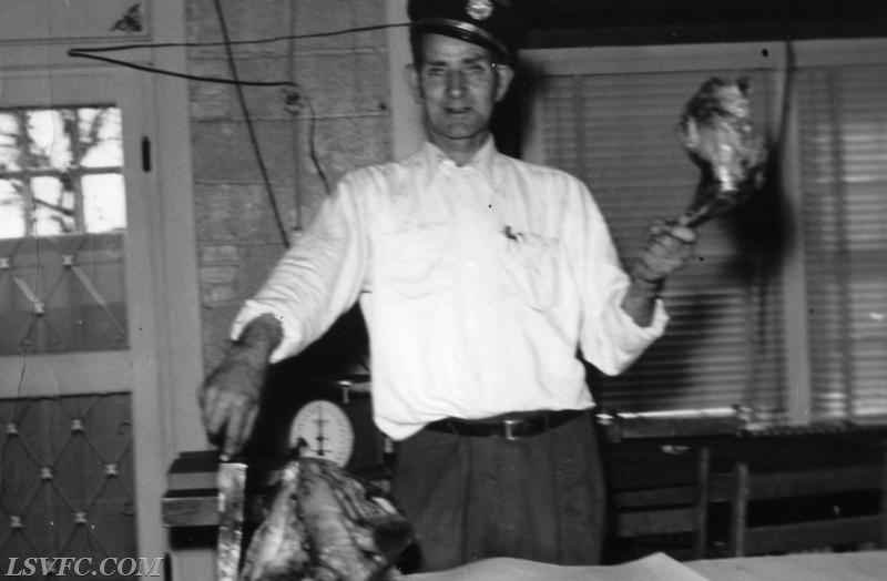 Chief Harrington carving for LSVFC Turkey Dinner.
