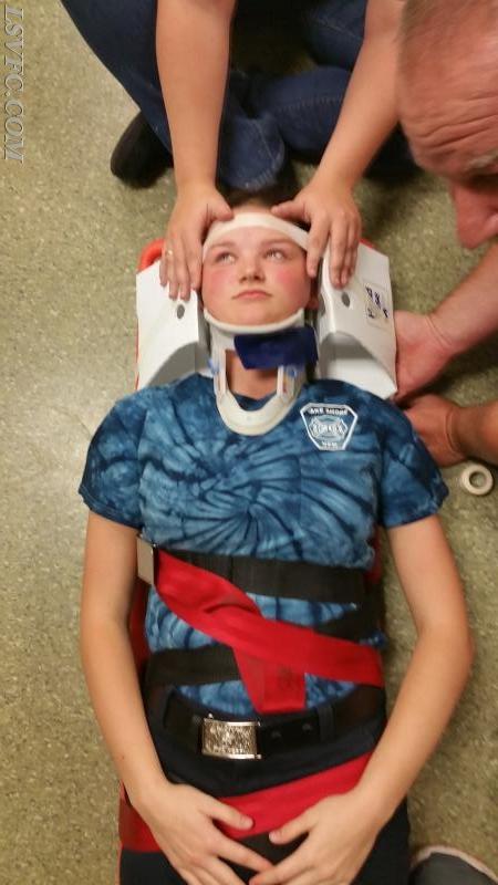 Spinal Immobilization Training With the Junior Firefighters.